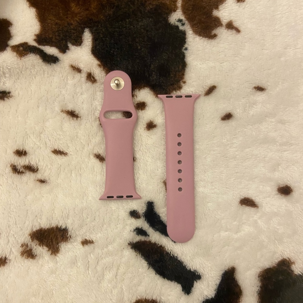 Apple Watch band in light purple.